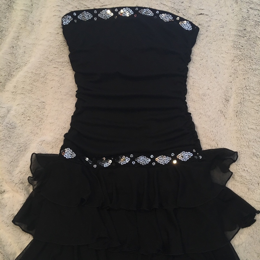 Black sleeveless “little black dress” by A. Byer